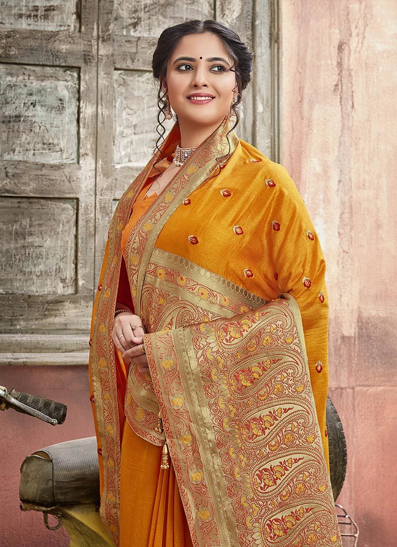 Triveni Rhythm Orange Wedding Wear Silk Saree